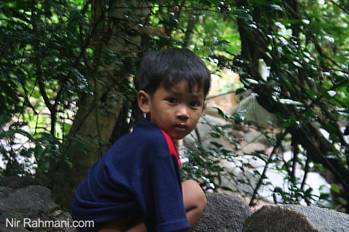 Thai people in Phuket jungle walk to a waterfall